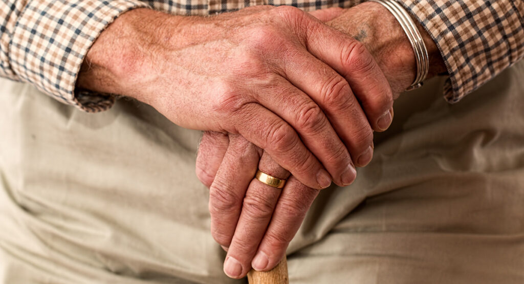 elderly man hands header